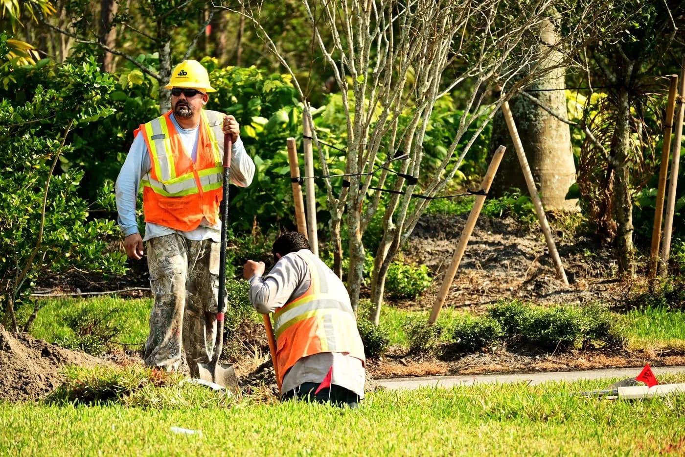 Absher Landscaping crew planting a new garden bed on site