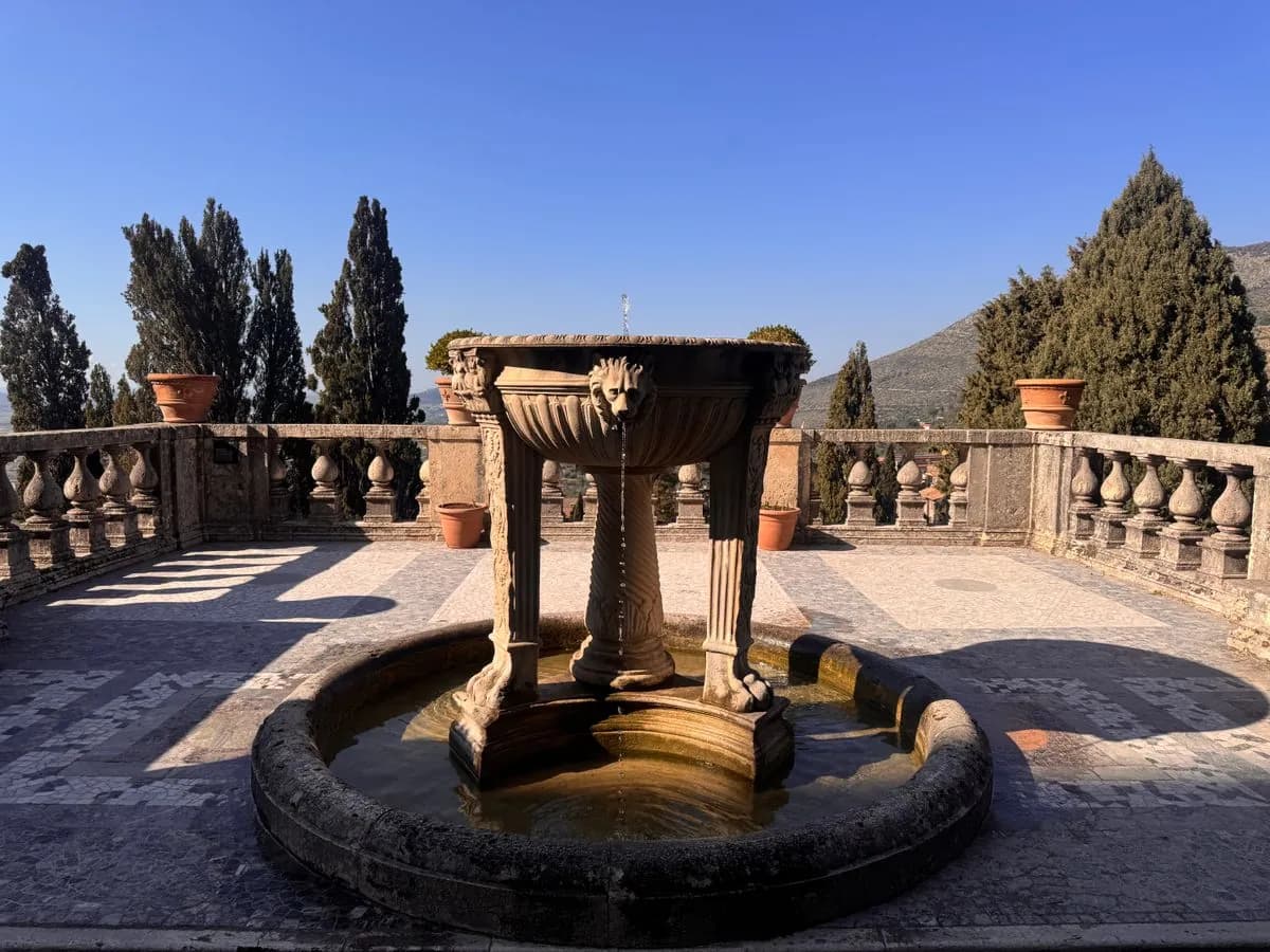 Hand-carved stone tiered fountain on a villa terrace in Palm Jumeirah
